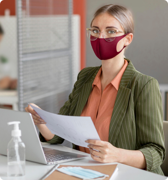 Infusion billing specialist reviewing a claim at her desk